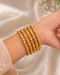 Gold Imitation, set of 6 gold-tone bangles