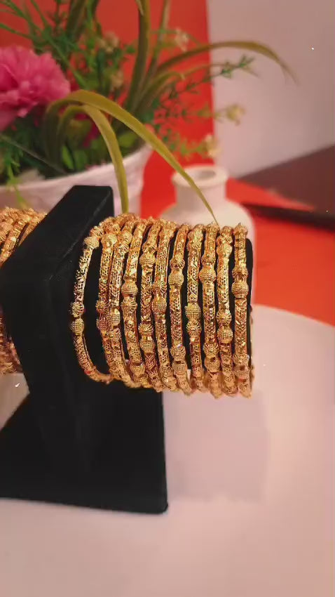 Gold Imitation, set of 6 gold-tone bangles