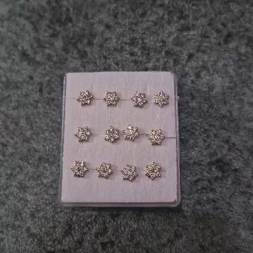 Royal Blossom – Gold-Tone White Crystal Floral Nose Pin